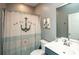 Nautically themed bathroom with an anchor shower curtain at 2024 Willow Run Dr., Little River, SC 29566