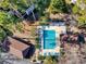 Aerial view of community pool and surrounding landscape at 204 Pipers Glenn # 204, Myrtle Beach, SC 29575