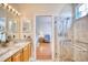 Main bathroom features granite vanity and a large shower at 204 Pipers Glenn # 204, Myrtle Beach, SC 29575