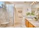 Elegant bathroom with granite double vanity and walk-in shower at 204 Pipers Glenn # 204, Myrtle Beach, SC 29575