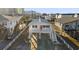 Elevated beach cottage view, showing surrounding homes at 205 56Th Ave. N, North Myrtle Beach, SC 29582