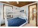 Cozy bedroom includes a twin-over-full bunk bed, and offers access to a nearby bathroom at 205 56Th Ave. N, North Myrtle Beach, SC 29582