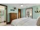 Light and airy bedroom with a dresser and en-suite bathroom at 205 56Th Ave. N, North Myrtle Beach, SC 29582