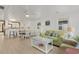 Open dining area with white table and chairs near living area at 205 56Th Ave. N, North Myrtle Beach, SC 29582