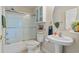 Bathroom with tub, shower, and pedestal sink at 209 Hillside Dr. N # 204, North Myrtle Beach, SC 29582