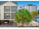 Two-story townhouse with balcony, parking, and a view of the pool at 209 Hillside Dr. N # 204, North Myrtle Beach, SC 29582