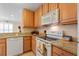 Well-equipped kitchen with granite countertops at 209 Hillside Dr. N # 204, North Myrtle Beach, SC 29582