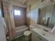 Clean bathroom with a tub, shower, and vanity at 2228 Oyster Cove, Murrells Inlet, SC 29576