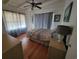 Bright bedroom with hardwood floors and ample natural light at 2228 Oyster Cove, Murrells Inlet, SC 29576