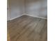 Bedroom with light grey walls and vinyl flooring at 2228 Oyster Cove, Murrells Inlet, SC 29576