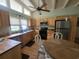 Bright kitchen with wood cabinets, stainless steel appliances, and an island at 2228 Oyster Cove, Murrells Inlet, SC 29576