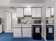 Small kitchenette with sink, mini-fridge and cabinets at 2801 S Ocean Blvd. # 1131, North Myrtle Beach, SC 29582