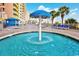 Refreshing mushroom-shaped fountain in a resort pool area at 2801 S Ocean Blvd. # 1131, North Myrtle Beach, SC 29582