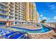 Resort pool with lounge chairs at 2801 S Ocean Blvd. # 1131, North Myrtle Beach, SC 29582