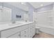 Bathroom with double sink vanity, quartz countertop, and a shower-tub combo at 2871 Ellesmere Circle, Myrtle Beach, SC 29579