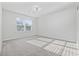 Bright bedroom with neutral carpet and lots of natural light from the window at 2871 Ellesmere Circle, Myrtle Beach, SC 29579