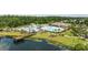 View of the community pool and lake from an elevated angle, showcasing the expansive amenities at 2871 Ellesmere Circle, Myrtle Beach, SC 29579