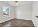 Spacious bedroom featuring wood-look flooring and a large window at 306 Andorra St., Longs, SC 29568