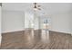 Open concept living room with hardwood floors and vaulted ceiling at 306 Andorra St., Longs, SC 29568