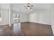 Spacious living room with hardwood floors and sliding glass doors at 306 Andorra St., Longs, SC 29568