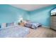 Bedroom with twin beds and light blue walls at 311 69Th Ave. N # 101, Myrtle Beach, SC 29572