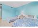 Bedroom with twin beds and light blue walls at 311 69Th Ave. N # 101, Myrtle Beach, SC 29572