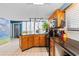 Spacious kitchen with island and beach-themed wall at 311 69Th Ave. N # 101, Myrtle Beach, SC 29572