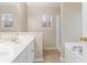 Bathroom with double vanity and bathtub at 320 Muirfield Rd., Myrtle Beach, SC 29588