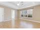 Bright bedroom with hardwood floors and large window at 320 Muirfield Rd., Myrtle Beach, SC 29588