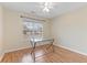 Bright bedroom with hardwood floors and a glass desk at 320 Muirfield Rd., Myrtle Beach, SC 29588