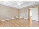 Spacious bedroom with hardwood floors and ceiling fan at 320 Muirfield Rd., Myrtle Beach, SC 29588