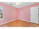 Pink bedroom with hardwood floors and a mural at 320 Muirfield Rd., Myrtle Beach, SC 29588