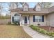 Front entrance with brick facade and landscaping at 320 Muirfield Rd., Myrtle Beach, SC 29588