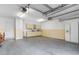 Spacious garage with overhead storage and a refrigerator at 320 Muirfield Rd., Myrtle Beach, SC 29588