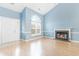 Living room with fireplace and hardwood floors, view of front door at 320 Muirfield Rd., Myrtle Beach, SC 29588