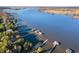 Aerial view of waterfront property with boat docks at 34 Pipedown Way, Pawleys Island, SC 29585