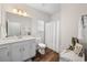 Clean bathroom with white vanity and shower/tub combo at 34 Pipedown Way, Pawleys Island, SC 29585