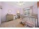 Charming bedroom with light walls and furniture for a  at 34 Pipedown Way, Pawleys Island, SC 29585