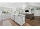 Modern kitchen with white cabinets, quartz countertops, and an island at 34 Pipedown Way, Pawleys Island, SC 29585