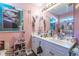 Bright bathroom with double vanity and large mirror at 35 Easter Lilly Ct., Murrells Inlet, SC 29576