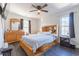 Cozy bedroom with wood bed frame and ceiling fan at 35 Easter Lilly Ct., Murrells Inlet, SC 29576