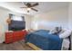 Bright bedroom with a large TV and a comfortable bed at 35 Easter Lilly Ct., Murrells Inlet, SC 29576