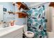 Clean bathroom with shower/tub and tropical decor at 3610 S Ocean Blvd. # 316, North Myrtle Beach, SC 29582