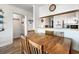 Cozy dining area with wood table and four chairs at 3610 S Ocean Blvd. # 316, North Myrtle Beach, SC 29582