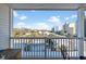 View from balcony showing ocean and neighboring buildings at 3610 S Ocean Blvd. # 316, North Myrtle Beach, SC 29582