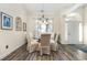 Charming dining room with glass-top table and four chairs at 3737 Kingsley Dr., Myrtle Beach, SC 29588