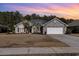 Brick ranch home with two-car garage and landscaped lawn at 3737 Kingsley Dr., Myrtle Beach, SC 29588