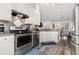 Modern kitchen with stainless steel appliances and white cabinets at 3737 Kingsley Dr., Myrtle Beach, SC 29588