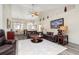 Spacious living room with hardwood floors and large windows at 3737 Kingsley Dr., Myrtle Beach, SC 29588