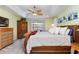 Spacious main bedroom with a king-size bed and ceiling fan at 3737 Kingsley Dr., Myrtle Beach, SC 29588